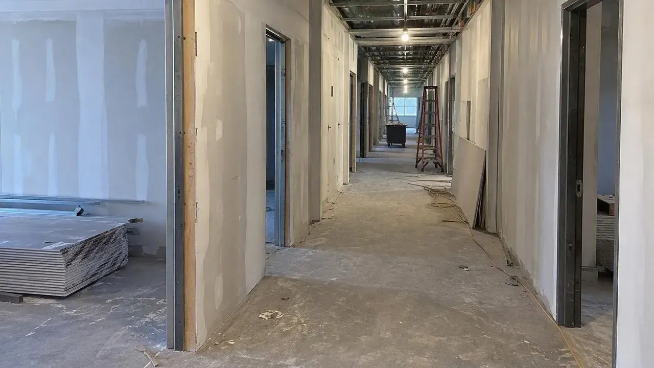 Commercial build-out with new drywall walls under construction