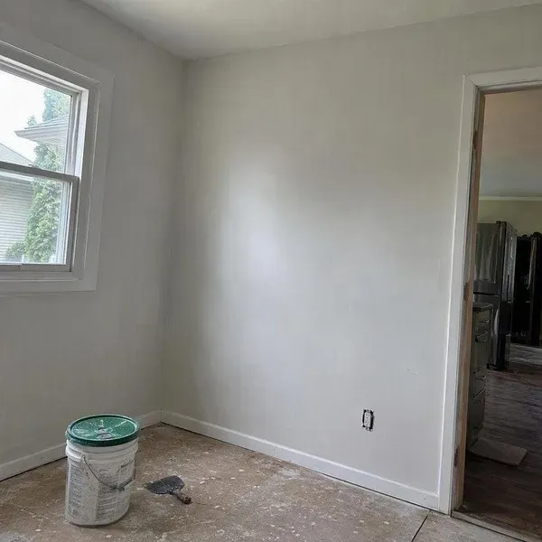 Water-damaged wall repaired with a smooth finish